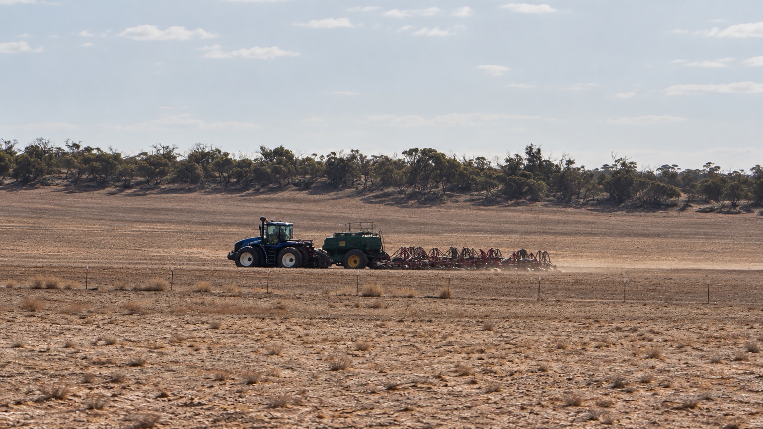 Open farm paddock extending across the Halidon property