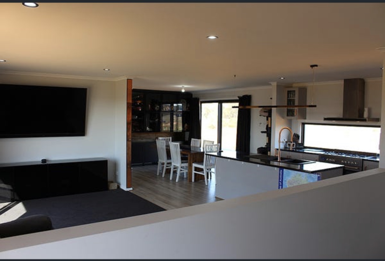 Open-plan kitchen, dining and living area in the main home